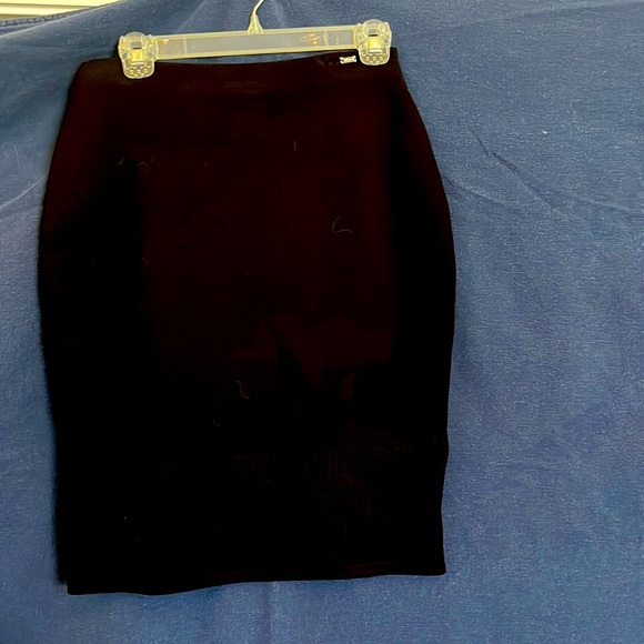 St. John size M black pencil skirt with cut outs on the bottom side slit - Picture 1 of 8